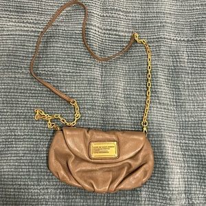 Good Condition. Purchased at Marc Jacob’s store in Paris. Taupe colour